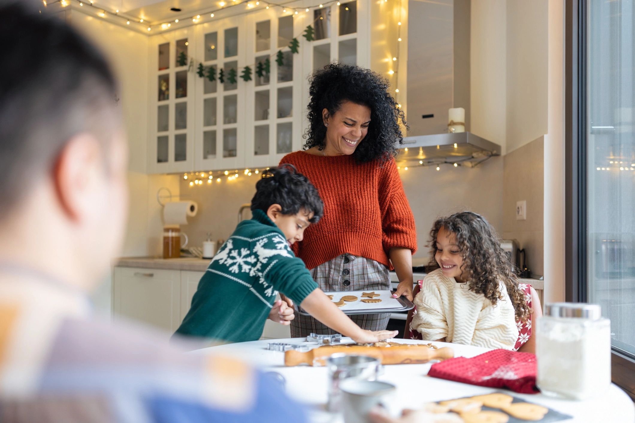 Family baking together in a kitchen