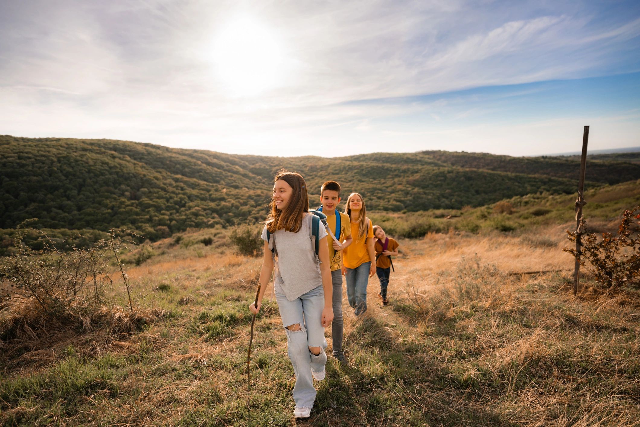 Children hiking together on a nature trail